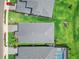Birds eye view of homes featuring green lawns, and gray roofs at 16336 Preservation Blvd, Punta Gorda, FL 33982
