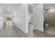 Bright, open hallway with clean lines and modern design, connecting various living spaces at 16336 Preservation Blvd, Punta Gorda, FL 33982