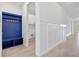 Hallway view with mudroom and laundry, offering organization, storage, and bright living at 16336 Preservation Blvd, Punta Gorda, FL 33982