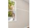Wall with clean white trim and a window letting in natural light at 1693 Jagust Rd, North Port, FL 34288