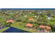 Expansive aerial view of a community with waterfront homes and lush green spaces at 17188 Cape Horn Blvd, Punta Gorda, FL 33955