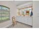 A bathroom with dual sinks, large vanity, and a large mirror at 17188 Cape Horn Blvd, Punta Gorda, FL 33955