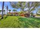 Well-manicured front yard with vibrant landscaping and a charming home exterior at 17188 Cape Horn Blvd, Punta Gorda, FL 33955