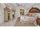 The main bedroom features tile flooring, a ceiling fan, and a walk-in closet at 17188 Cape Horn Blvd, Punta Gorda, FL 33955