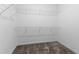 Walk-in closet with carpet and metal shelving at 17200 Gulfspray Cir, Port Charlotte, FL 33948
