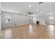 Bright living room with light wood floors and recessed lighting at 17200 Gulfspray Cir, Port Charlotte, FL 33948