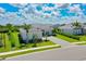 Inviting front exterior with a stone driveway and professionally landscaped front yard at 17336 Sandpearl Rd, Venice, FL 34293