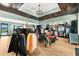 Well-stocked pro shop with a variety of golf apparel, shoes, bags, and accessories on display at 17336 Sandpearl Rd, Venice, FL 34293