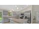 Bright kitchen featuring stainless steel appliances and granite countertops at 1983 Longstroth Ave, North Port, FL 34288