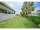 Spacious backyard with lush greenery and privacy at 21524 Edgewater Dr, Port Charlotte, FL 33952