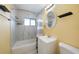 Bright bathroom with a shower-tub combination and a modern vanity at 21524 Edgewater Dr, Port Charlotte, FL 33952