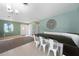 Dining area featuring modern lighting, seating, and an open feel at 21524 Edgewater Dr, Port Charlotte, FL 33952