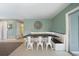 Open dining space with built-in bench seating and view of entryway at 21524 Edgewater Dr, Port Charlotte, FL 33952