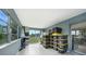 Bright Florida room with large windows and tile flooring at 21524 Edgewater Dr, Port Charlotte, FL 33952