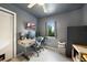 Well-lit office with desk, modern décor, and a window at 21524 Edgewater Dr, Port Charlotte, FL 33952