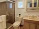 Bathroom featuring shower, toilet, and sink with light-toned vanity at 2220 Broad Ranch Dr, Port Charlotte, FL 33948