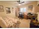 Bedroom featuring a desk, ceiling fan, and carpeted floors at 2220 Broad Ranch Dr, Port Charlotte, FL 33948