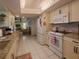 Bright kitchen featuring modern appliances and ample cabinet space at 2220 Broad Ranch Dr, Port Charlotte, FL 33948