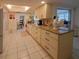 Well-equipped kitchen featuring sleek countertops and cabinets, with easy access to dining areas at 2220 Broad Ranch Dr, Port Charlotte, FL 33948