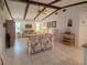 Bright living room featuring a vaulted ceiling and comfortable seating at 2220 Broad Ranch Dr, Port Charlotte, FL 33948