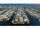 Beautiful aerial view showing the canal front neighborhood, home highlighted with arrow at 245 Lido Dr, Punta Gorda, FL 33950