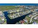 Beautiful aerial view showing the canal front neighborhood, home highlighted with arrow at 245 Lido Dr, Punta Gorda, FL 33950