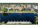 Beautiful aerial view of the property showcasing the backyard, canal, and private boat dock at 245 Lido Dr, Punta Gorda, FL 33950