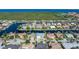 Aerial view of waterfront neighborhood with many canals, homes, and direct water access at 245 Lido Dr, Punta Gorda, FL 33950