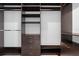 Custom closet featuring adjustable shelves and drawer space for efficient organization at 245 Lido Dr, Punta Gorda, FL 33950