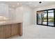 Dining area with marble floors and glass doors overlooking the pool at 245 Lido Dr, Punta Gorda, FL 33950