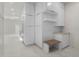 Hallway with marble floors and white cabinets at 245 Lido Dr, Punta Gorda, FL 33950