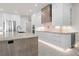 Modern kitchen view with large island, stainless steel appliances, and custom cabinetry at 245 Lido Dr, Punta Gorda, FL 33950