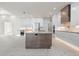 Modern kitchen featuring a wooden island, stainless steel appliances, and ample counter space at 245 Lido Dr, Punta Gorda, FL 33950