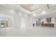 Bright and airy living space featuring modern finishes and expansive marble flooring at 245 Lido Dr, Punta Gorda, FL 33950
