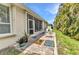 Outdoor patio with chairs, perfect for relaxing and enjoying the serene surroundings at 24504 Buckingham Way, Punta Gorda, FL 33980