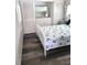 Bedroom with a bed featuring seashell patterned bedding at 326 Trailorama Dr, North Port, FL 34287