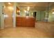 Bathroom featuring tiled floors, a walk-in shower, and a bathtub at 39 Norman St, Port Charlotte, FL 33954