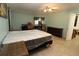 Bedroom with tiled flooring, ceiling fan, and dresser at 39 Norman St, Port Charlotte, FL 33954