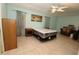 Bedroom with tiled flooring, a ceiling fan, and curtains at 39 Norman St, Port Charlotte, FL 33954