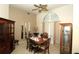 Inviting dining room featuring classic wood furniture and ample natural light at 39 Norman St, Port Charlotte, FL 33954