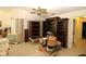 Living room with tiled flooring, ceiling fan, and furniture at 39 Norman St, Port Charlotte, FL 33954