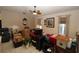 Living room with tile flooring, boxes, and ceiling fan at 39 Norman St, Port Charlotte, FL 33954
