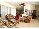 Spacious living room with tile floors, and wicker seating, perfect for relaxing at 39 Norman St, Port Charlotte, FL 33954