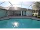 The pool offers a relaxing retreat with a sun deck and access to outdoor living spaces at 39 Norman St, Port Charlotte, FL 33954