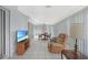 Bright sun room offering plenty of space and natural light for relaxing and entertaining at 475 Whippoorwill Dr, Venice, FL 34293