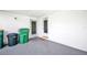 The covered carport has a door to the main house and the backyard at 769 Crestview Nw Cir, Port Charlotte, FL 33948