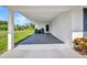 Covered carport area providing ample space with access to the main house and backyard at 769 Crestview Nw Cir, Port Charlotte, FL 33948