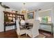 Well-appointed dining room featuring refined furniture and decor, ideal for hosting memorable dinner parties at 825 Via Tunis, Punta Gorda, FL 33950
