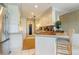 Bright kitchen with updated cabinetry, offering functionality and style for culinary enthusiasts and daily living at 825 Via Tunis, Punta Gorda, FL 33950