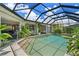 Backyard pool with a screened enclosure and view of the lanai at 825 Via Tunis, Punta Gorda, FL 33950